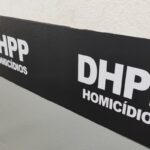 Parede com logo da DHPP